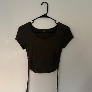Hi! today I am selling a olive green tee that ties on the side:)